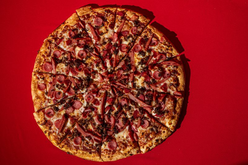 Papa Ginos Meat Lovers Special Pizza with sausage and bacon